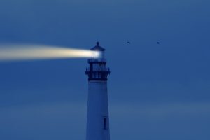 Lighthouse light rays shining.